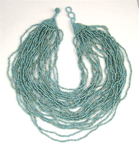 Native American Seed Bead Turquoise 28 Strand Bib Necklace At 1stdibs Native American Seed