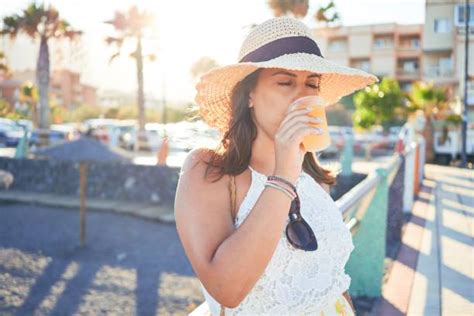 Person Drinking Slushie Stock Photos Pictures And Royalty Free Images