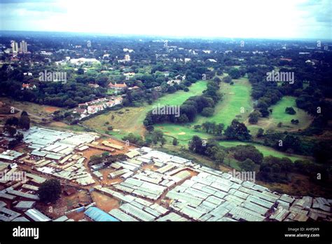 Aerial view of Kibera slum and the adjacent Royal Nairobi Golf Club Stock Photo: 8300568 - Alamy