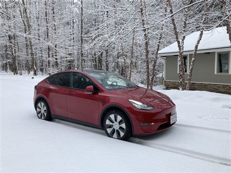 2024 Tesla Model Y Performance Ultra Red Issie Dominica