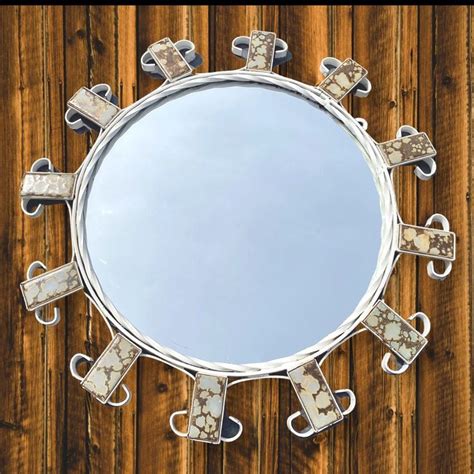 A Round Mirror On A Wooden Wall