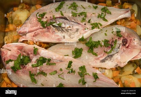 Flat Lay Of The Preparation Of A Recipe For Three Halves Of Baked Sea