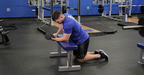 One Arm Dumbbell Wrist Curl Over Bench Video Exercise Guide Tips