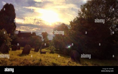 Sunsets Over Graveyard Stock Photo Alamy