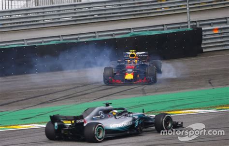 Winner Lewis Hamilton Mercedes Amg F1 W09 Passes A Spinning Max Verstappen Red Bull Racing