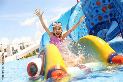 Little Girl On Slide At Water Park Summer Vacation Stock Photo Adobe