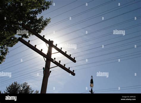 Telephone lines on old telephone pole Stock Photo - Alamy