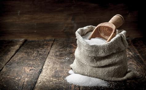 Premium Photo Salt In A Wooden Spoon