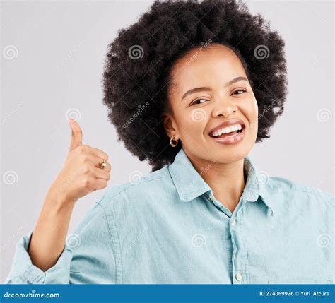 Portrait Thumbs Up And Black Woman Laughing In Studio Isolated On A