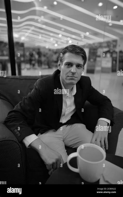 Mid Adult Man Sitting Coffee Shop Black And White Stock Photos And Images