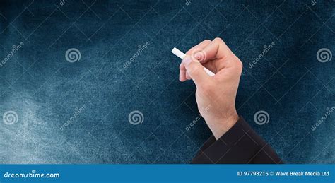 Composite Image Of Hand Holding A Chalk And Writing Something Stock