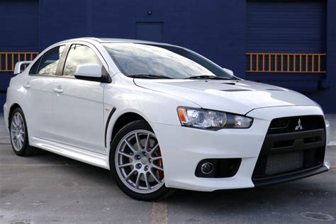 13k Mile 2010 Mitsubishi Lancer Evolution X GSR 5 Speed For Sale On BaT