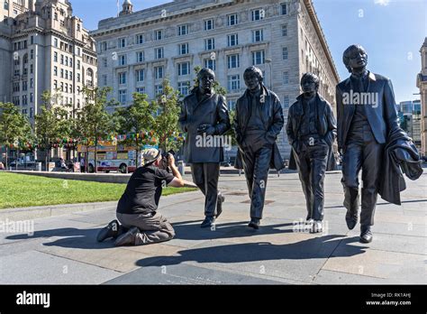 Beatles Statue At Pier Head In Liverpool Stock Photo Alamy