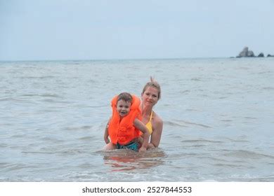 Hundred Mom Bikini Sons Royalty Free Images Stock Photos Pictures Shutterstock