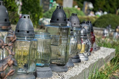 Votive Candles Lantern On The Grave In Slovak Cemetery All Saints Day