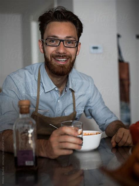 Man Eating At Home By Stocksy Contributor Milles Studio Man