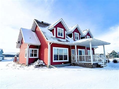 Wetaskiwin County Sunset Harbour Cape Cod Storey Home In Red