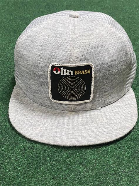 Vintage Olin Brass Snapback K Hat Grailed