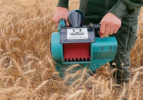 Handheld Combine Provides Grain Samples The Western Producer