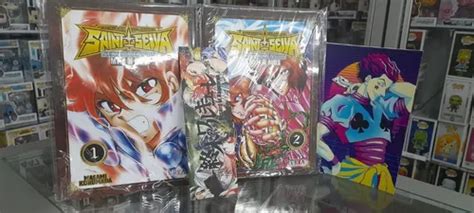 Pack 2 Tomos Saint Seiya Next Dimension Regalo Ivrea Arg Cuotas