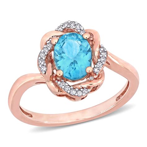 Miabella Women S 1 1 3 Carat Oval Cut Apatite 1 10 Carat Diamond 10kt Rose Gold Twisted Halo