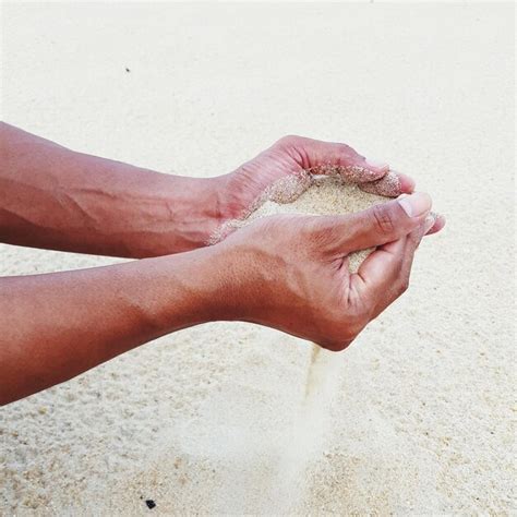 Premium Photo Hands Holding Sand At Beach Person