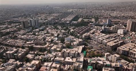 Drone Flying Over Karachi City Skyline In Pakistan With Haze Seen In ...