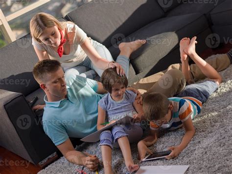 Family in livingroom 10707395 Stock Photo at Vecteezy