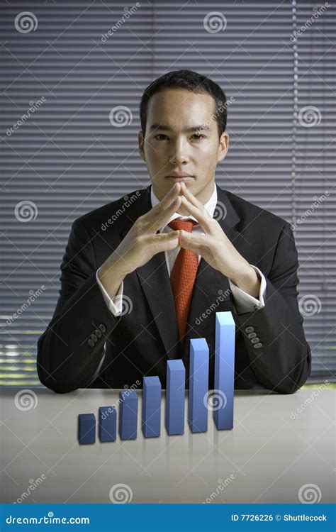 Business Man With A 3d Growth Chart Stock Photo Image Of Financial