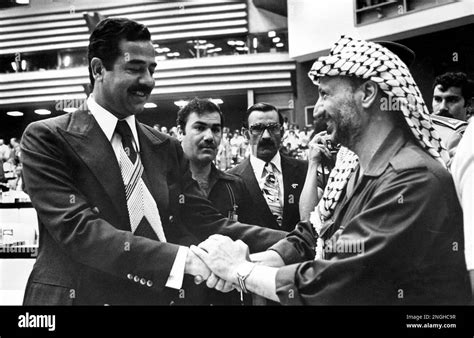 Iraqi President Saddam Hussein Left Greets Yasser Arafat Chairman Of