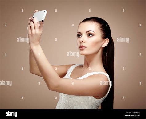 Beautiful Young Woman Taking Selfie Girl Photographing Herself With Phone Beauty Fashion