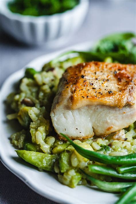 Pan Seared Halibut With Avocado Risotto Olive And Mango