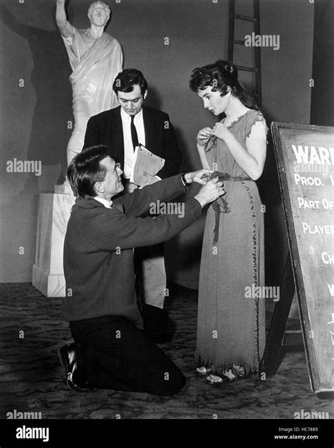 SPARTACUS, Jean Simmons on set during a costume fitting, 1960 Stock ...