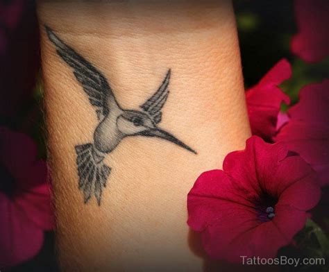 Hummingbird Tattoo Design On Wrist | Tattoo Designs, Tattoo Pictures