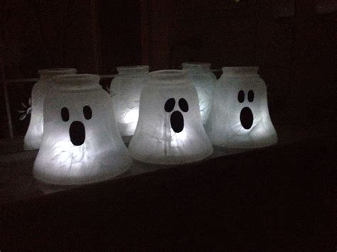 Halloween Ghost Luminaries Made From Old Chandelier Globes And Battery