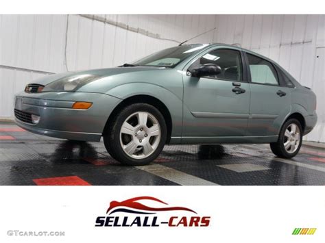 2004 Light Tundra Metallic Ford Focus Zts Sedan 102308023 Photo 1