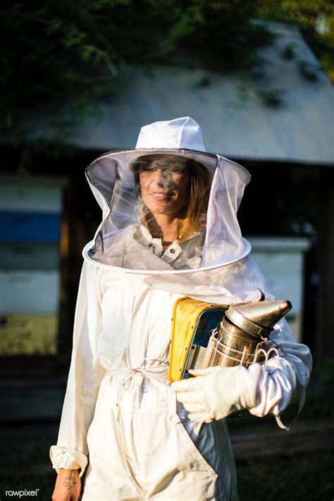 Beekeeper Posing With The Smoker Premium Image By