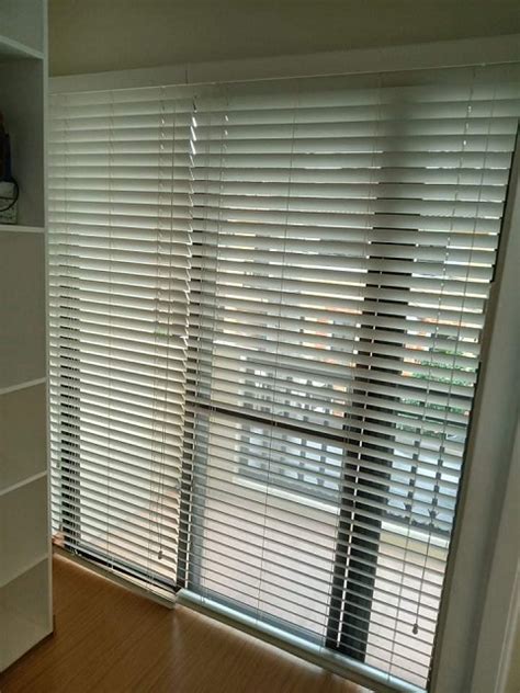 White Faux Wood Blinds for Better Privacy and Insulation