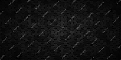 Premium Photo | Black wallpaper with a hexagon pattern