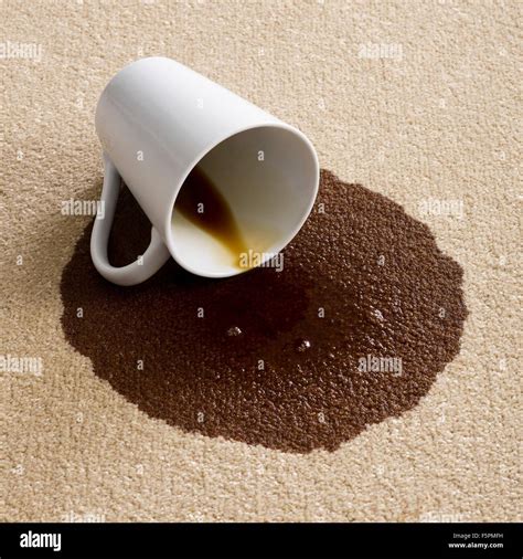 Coffee spilled on the carpet Stock Photo - Alamy