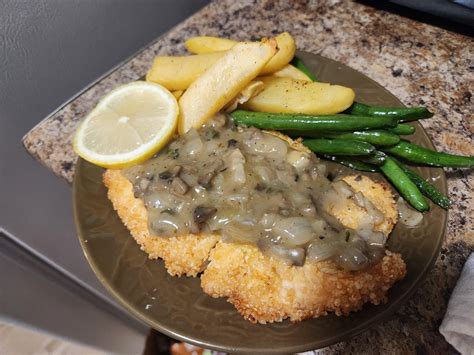 [homemade] Chicken Schnitzel With Mushroom Gravy Served With Green Beans And Fries R Food