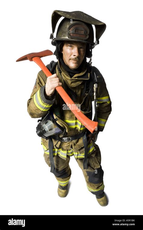 Portrait of a firefighter with axe Stock Photo - Alamy