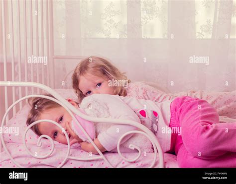 Little girl sleeping in bed hi-res stock photography and images - Alamy