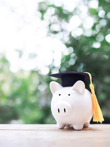 Premium Photo Piggy Bank With Graduation Hat The Concept Of Saving