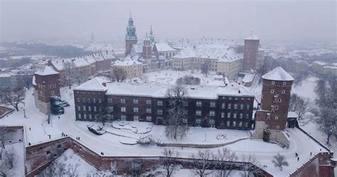 Aerial View Of Wawel Royal Castle And Cathedral Covered With Snow In