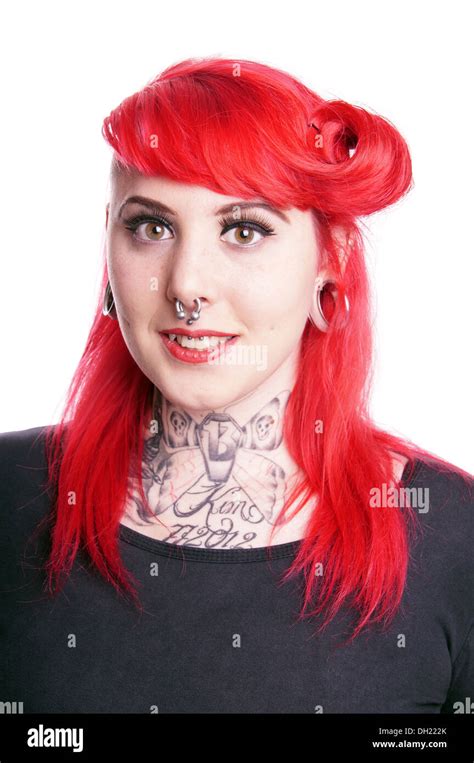 Young Woman With Facial Piercings And Tattoos Stock Photo Alamy