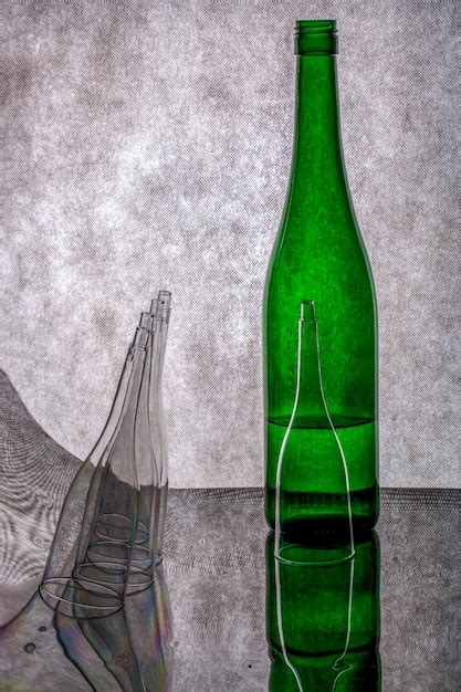 Premium Photo Still Life With A Green Bottle And Conical Transparent