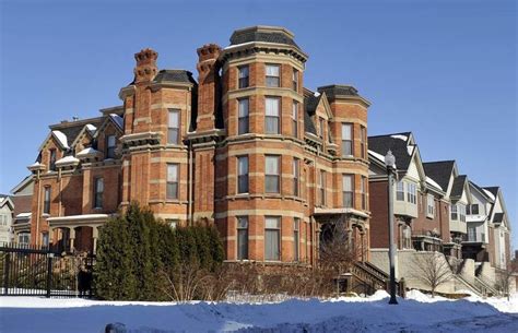 a large brick building with many windows and balconies in the front ...