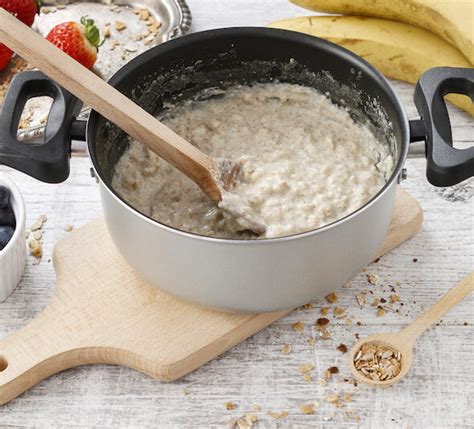 A pot of porridge among fresh fruits. Healthy food. - The Green Kitchen