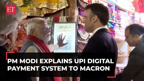 Pm Modi Explains Upi System To French President Macron Outside Local